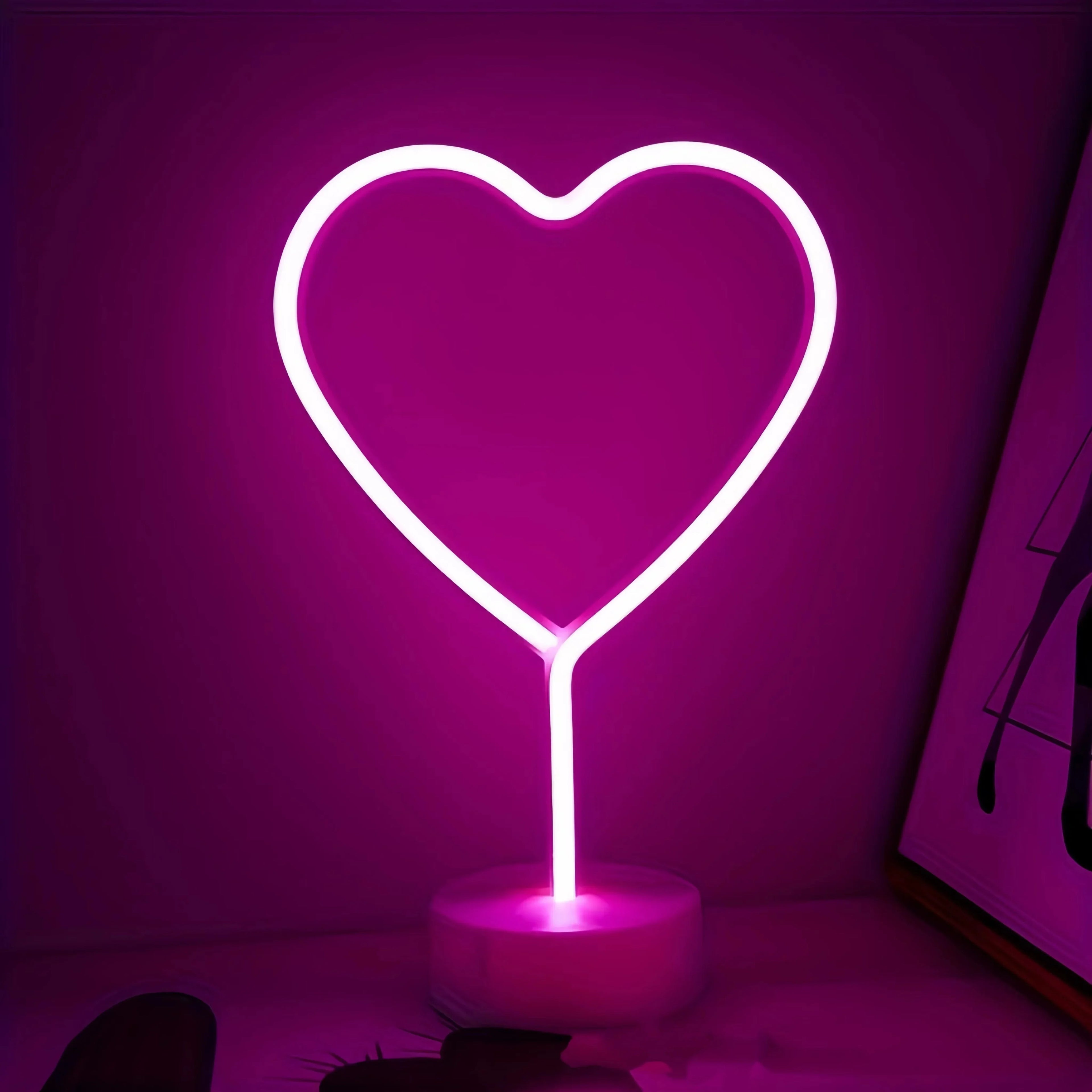 Heart Neon Light glowing in a small bedroom